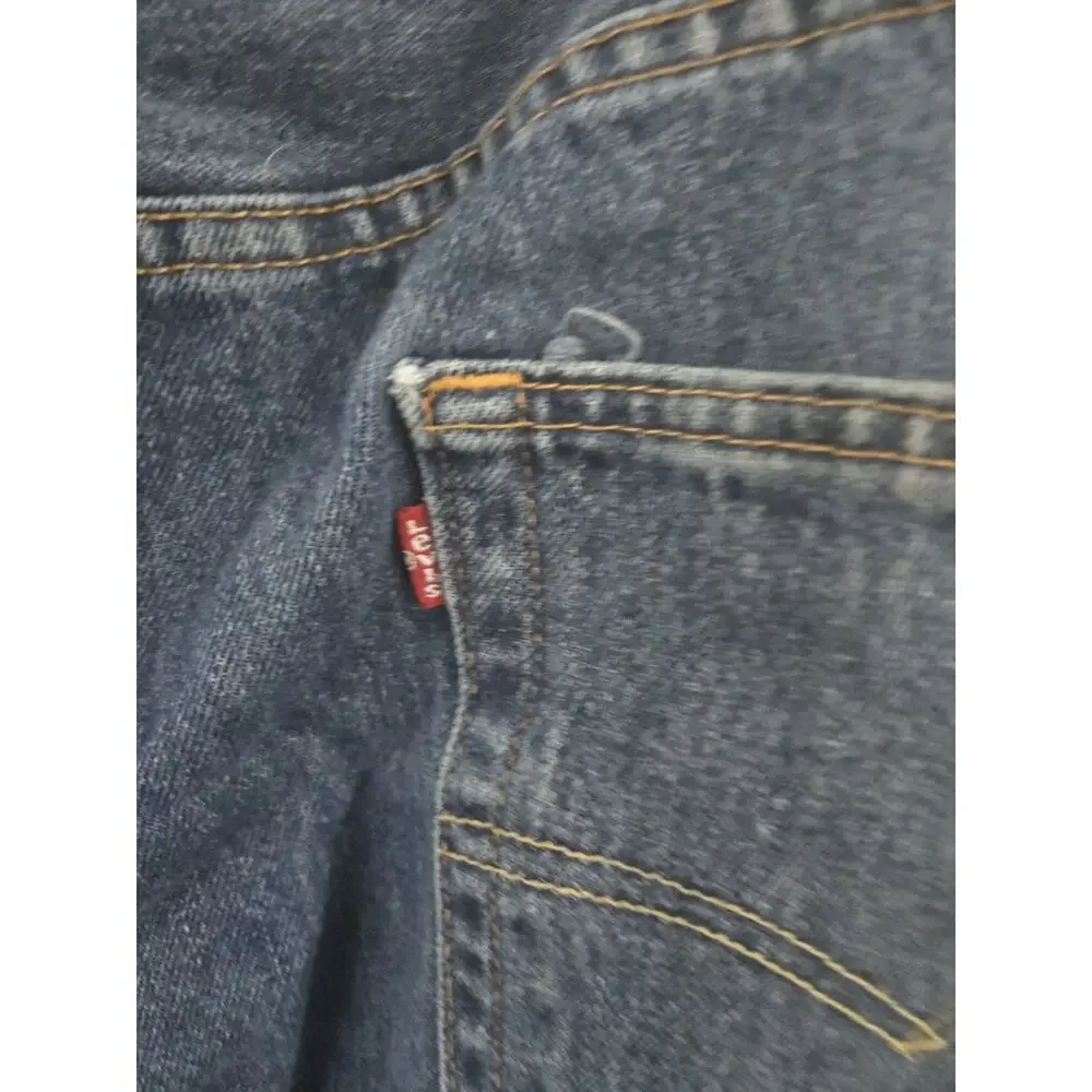 Vintage Levi's 550 Jeans Men's Relaxed straight leg Size 44x30 medium wash blue